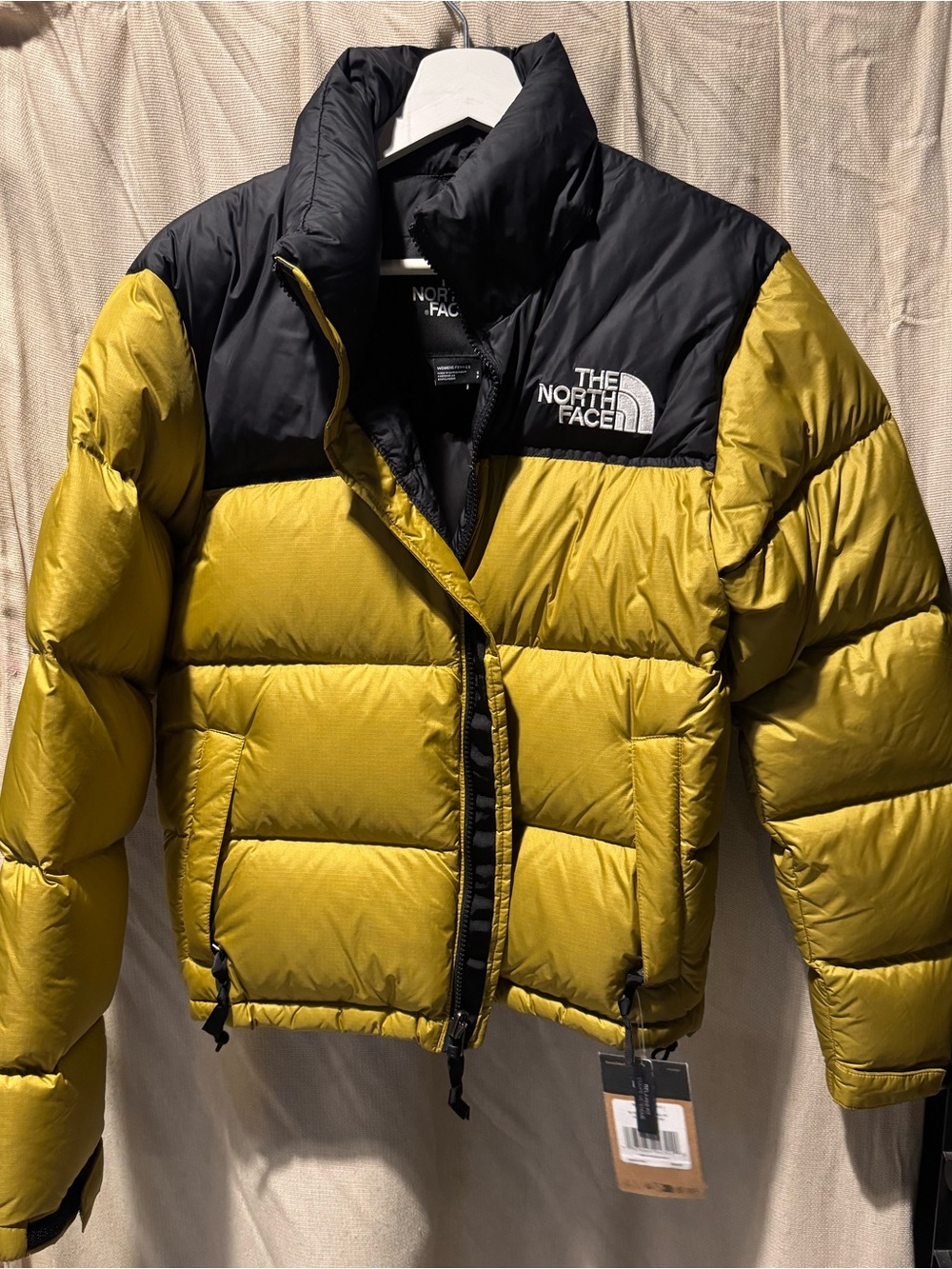 The North Face Puffer Jacket in Mustard Yellow and Black Panel